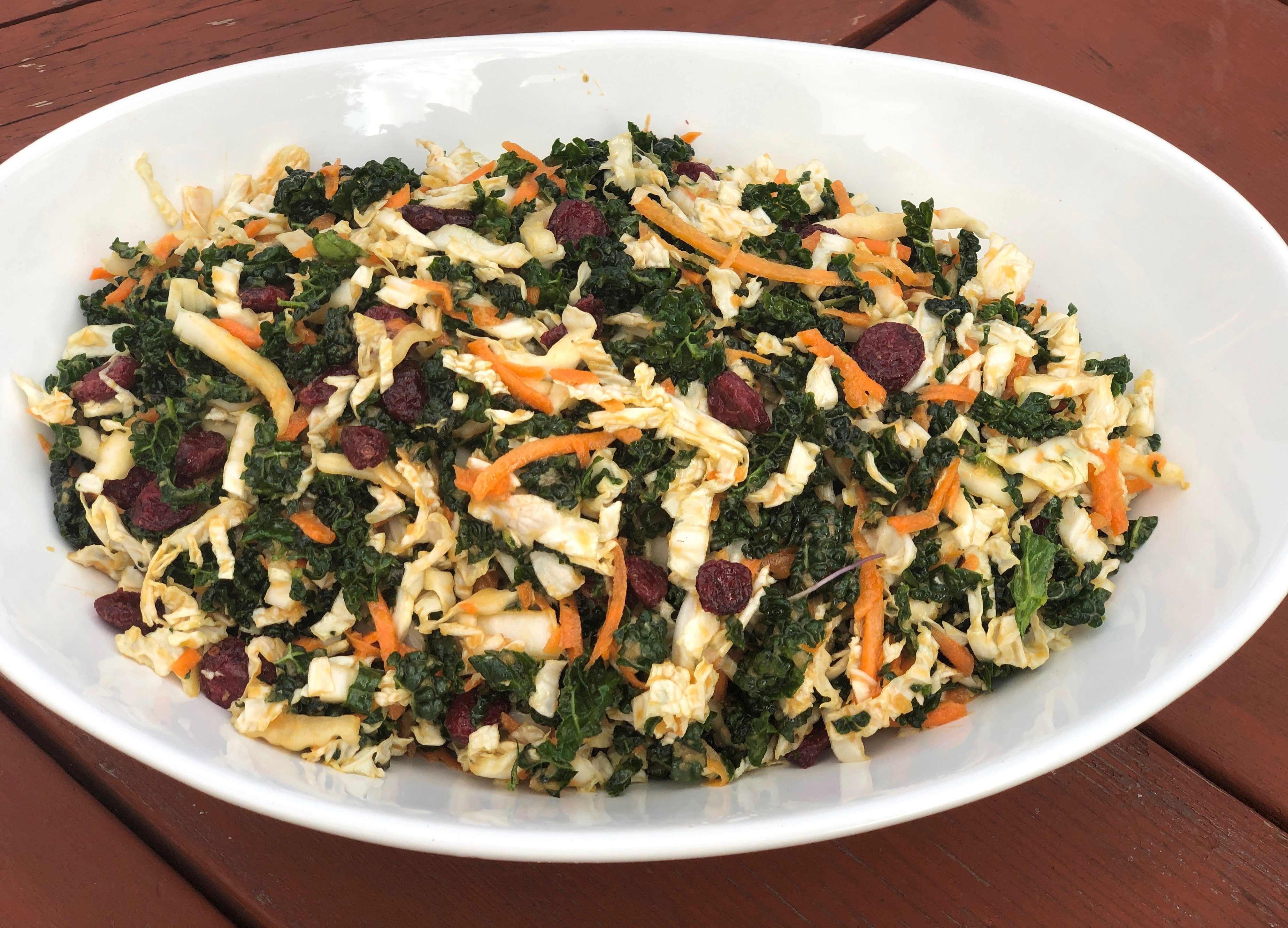 Image for Kale and Napa Cabbage Salad with Carrots and Cranberries, served with a Japanese Dressing